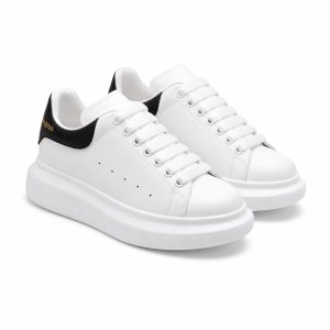 White Platform Sneakers with Black Heel Detail - View 1