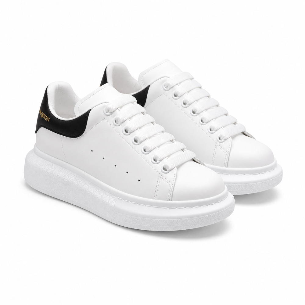 White Platform Sneakers with Black Heel Detail - View 1